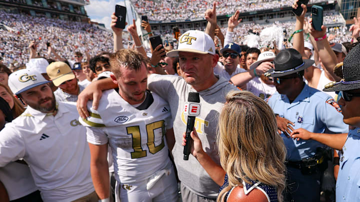 Sep 13, 2025; Atlanta, Georgia, USA; Georgia Tech Yellow Jackets quarterback Haynes King (10) and head coach Brent Key talk to a reporter after a victory over the Clemson Tigers at Bobby Dodd Stadium at Hyundai Field. Mandatory Credit: Brett Davis-Imagn Images Sep 13, 2025; Atlanta, Georgia, USA; Georgia Tech Yellow Jackets quarterback Haynes King (10) and head coach Brent Key talk to a reporter after a victory over the Clemson Tigers at Bobby Dodd Stadium at Hyundai Field. Mandatory Credit: Brett Davis-Imagn Images