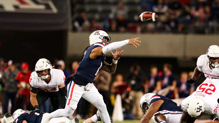 Nov 15, 2024; Tucson, Arizona, USA; Arizona Wildcats quarterback Noah Fifita (11) throws the ball during the first quarter against the Houston Cougars at Arizona Stadium. Mandatory Credit: Aryanna Frank-Imagn Images