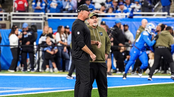 Detroit Lions head coach Dan Campbell talks to offensive coordinator John Morton at warmup ahead of the Minnesota Vikings game at Ford Field in Detroit on Sunday, November 2, 2025.