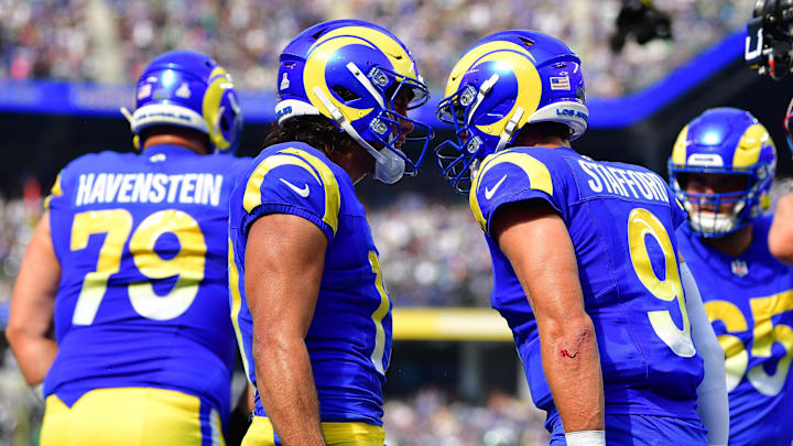 Oct 8, 2023; Inglewood, California, USA; Los Angeles Rams wide receiver Puka Nacua (17) celebrates his touchdown scored against the Philadelphia Eagles with quarterback Matthew Stafford (9) during the first half at SoFi Stadium.  
