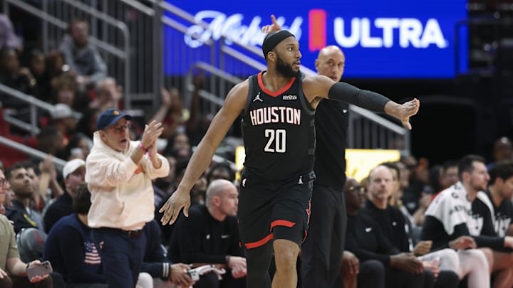 Feb 25, 2026; Houston, Texas, USA; Houston Rockets guard Josh Okogie (20) reacts after scoring a basket during the third quarter against the Sacramento Kings at Toyota Center. Mandatory Credit: Troy Taormina-Imagn Images