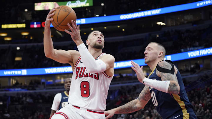 Jan 14, 2025; Chicago, Illinois, USA; New Orleans Pelicans center Daniel Theis (10) defends Chicago Bulls guard Zach LaVine (8) during the second half at United Center. Mandatory Credit: David Banks-Imagn Images