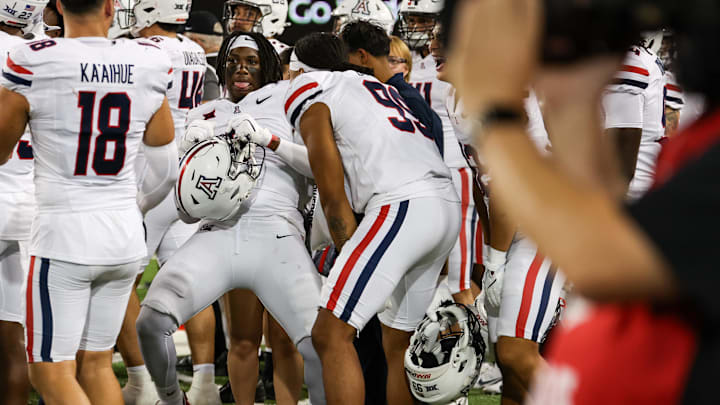 Aug 31, 2024; Tucson, Arizona, USA; Arizona Wildcats linebacker Sterling Lane II (8) dances with team on sidelines during third quarter at Arizona Stadium. Mandatory Credit: Aryanna Frank-Imagn Images