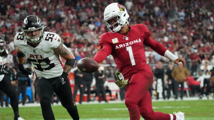 Arizona Cardinals quarterback Kyler Murray (1) runs the ball in for a touchdown past Atlanta Falcons linebacker Nate Landman. Arizona Cardinals quarterback Kyler Murray (1) runs the ball in for a touchdown past Atlanta Falcons linebacker Nate Landman.