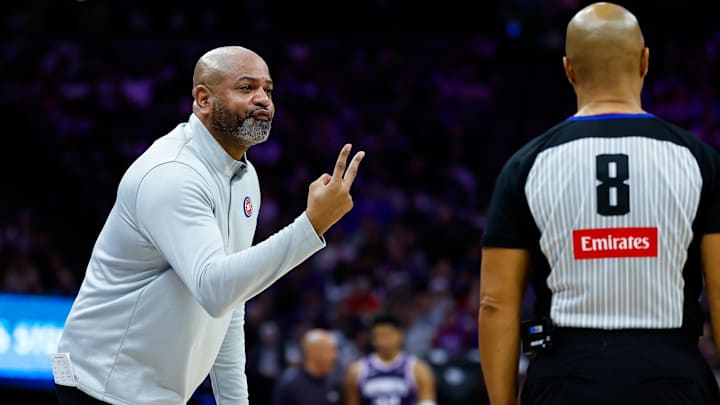 Dec 23, 2025; Sacramento, California, USA; Detroit Pistons head coach J.B. Bickerstaff argues a call with referee Marc Davis (8) during the second quarter against the Sacramento Kings at Golden 1 Center. Mandatory Credit: Sergio Estrada-Imagn Images