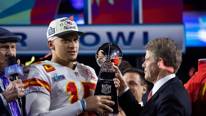 Feb 12, 2023; Glendale, Arizona, US; Kansas City Chiefs quarterback Patrick Mahomes (15) is handed the Vince Lombardi Trophy by team owner Clark Hunt after defeating the Philadelphia Eagles during Super Bowl LVII at State Farm Stadium. Mandatory Credit: Mark J. Rebilas-Imagn Images Feb 12, 2023; Glendale, Arizona, US; Kansas City Chiefs quarterback Patrick Mahomes (15) is handed the Vince Lombardi Trophy by team owner Clark Hunt after defeating the Philadelphia Eagles during Super Bowl LVII at State Farm Stadium. Mandatory Credit: Mark J. Rebilas-Imagn Images