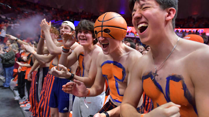 Mar 7, 2025; Champaign, Illinois, USA;  Illinois Fighting Illini fans cheer during the first half against the Purdue Boilermakers at State Farm Center. Mandatory Credit: Ron Johnson-Imagn Images