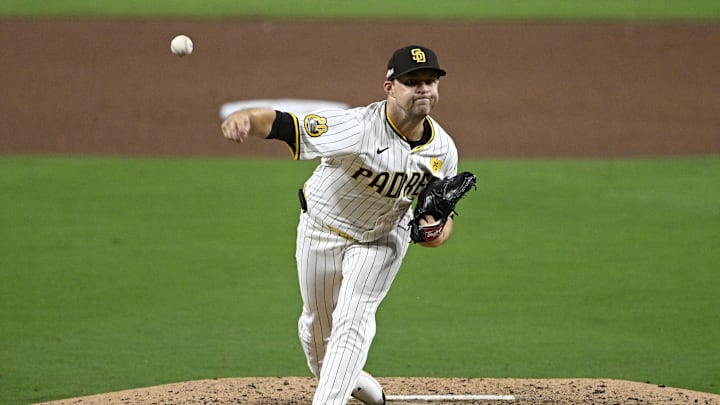 Oct 1, 2024; San Diego, California, USA; San Diego Padres pitcher Michael King (34) throws a pitch against the Atlanta Braves during the fifth inning in game one of the Wildcard round for the 2024 MLB Playoffs at Petco Park. Mandatory Credit: Denis Poroy-Imagn Images