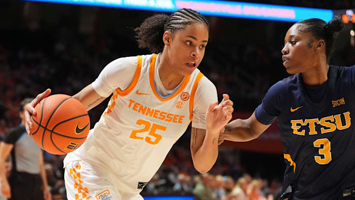 Tennessee guard Deniya Prawl (25) tries to get to the basket while guarded by ETSU guard SaBreya Monsanto (3) during an NCAA college basketball game on November 7, 2025, in Knoxville, Tenn. Tennessee guard Deniya Prawl (25) tries to get to the basket while guarded by ETSU guard SaBreya Monsanto (3) during an NCAA college basketball game on November 7, 2025, in Knoxville, Tenn.