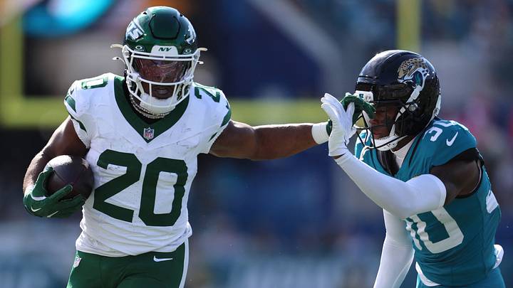 Dec 14, 2025; Jacksonville, Florida, USA; New York Jets running back Breece Hall (20) runs with the ball against Jacksonville Jaguars cornerback Montaric Brown (30) during the first quarter at EverBank Stadium. Mandatory Credit: Morgan Tencza-Imagn Images Dec 14, 2025; Jacksonville, Florida, USA; New York Jets running back Breece Hall (20) runs with the ball against Jacksonville Jaguars cornerback Montaric Brown (30) during the first quarter at EverBank Stadium. Mandatory Credit: Morgan Tencza-Imagn Images