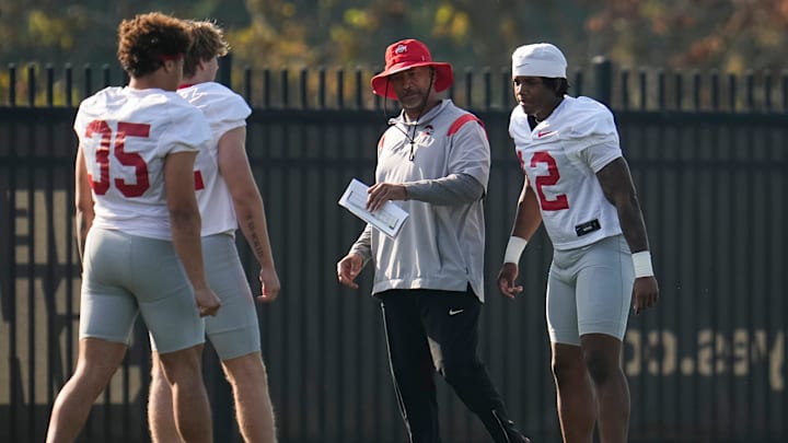 Ohio State Buckeyes secondary coach Tim Walton works with cornerback Bryce West (12) during football training camp at the Woody Hayes Athletic Center on Aug. 1, 2025.