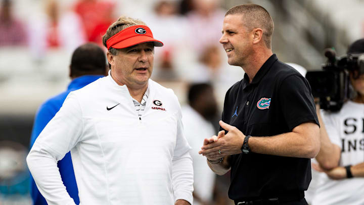 Florida Gators head coach Billy Napier and Georgia Bulldogs head coach Kirby Smart talk before the game at TIAA Bank Field in Jacksonville, FL on Saturday, October 29, 2022. [Matt Pendleton/Gainesville Sun]

Ncaa Football Florida Gators Vs Georgia Bulldogs