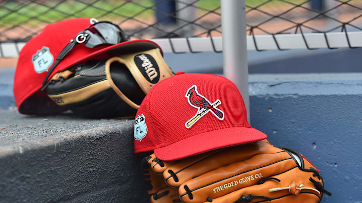 Mar 3, 2017; West Palm Beach, FL, USA; A view of St. Louis Cardinals hats and gloves on the steps of the dugout in the game against the Washington Nationals at The Ballpark of the Palm Beaches. Mandatory Credit: Jasen Vinlove-Imagn Images Mar 3, 2017; West Palm Beach, FL, USA; A view of St. Louis Cardinals hats and gloves on the steps of the dugout in the game against the Washington Nationals at The Ballpark of the Palm Beaches. Mandatory Credit: Jasen Vinlove-Imagn Images