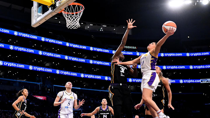 Jul 13, 2025; Los Angeles, California, USA; Los Angeles Sparks guard Kelsey Plum (10) during up a shot over Connecticut Sun center Tina Charles (31) during the third quarter at Crypto.com Arena. Mandatory Credit: Robert Hanashiro-Imagn Images Jul 13, 2025; Los Angeles, California, USA; Los Angeles Sparks guard Kelsey Plum (10) during up a shot over Connecticut Sun center Tina Charles (31) during the third quarter at Crypto.com Arena. Mandatory Credit: Robert Hanashiro-Imagn Images
