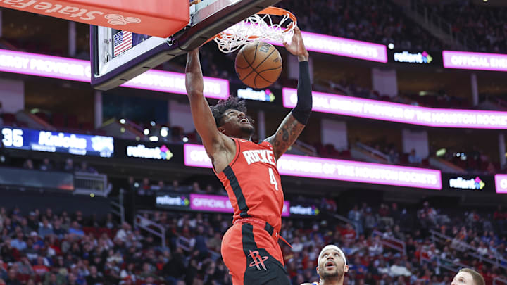 Feb 12, 2024; Houston, Texas, USA; Houston Rockets guard Jalen Green (4) dunks the ball as New York