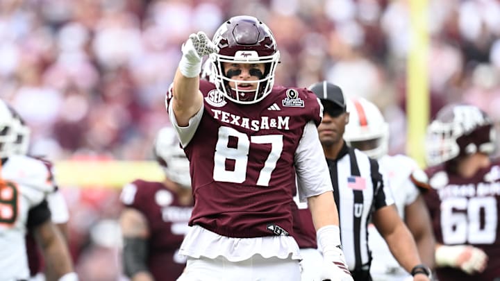 Dec 20, 2025; College Station, TX, USA; Texas A&M Aggies tight end Nate Boerkircher (87) celebrates a first down against the Miami Hurricanes during first quarter of the first round game of the CFP National Playoff at Kyle Field. Mandatory Credit: Maria Lysaker-Imagn Images
