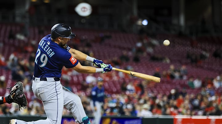 Seattle Mariners catcher Cal Raleigh (29) hits a solo home run in the seventh inning against the Cincinnati Reds at Great American Ball Park on April 16. Seattle Mariners catcher Cal Raleigh (29) hits a solo home run in the seventh inning against the Cincinnati Reds at Great American Ball Park on April 16.