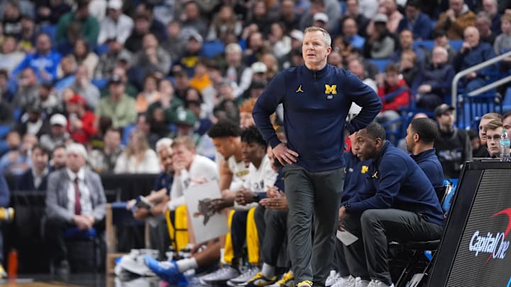 Mar 21, 2026; Buffalo, NY, USA; Michigan Wolverines head coach Dusty May looks on during the first half against the Saint Louis Billikens during a second round game of the men's 2026 NCAA Tournament at Keybank Center. Mandatory Credit: Gregory Fisher-Imagn Images