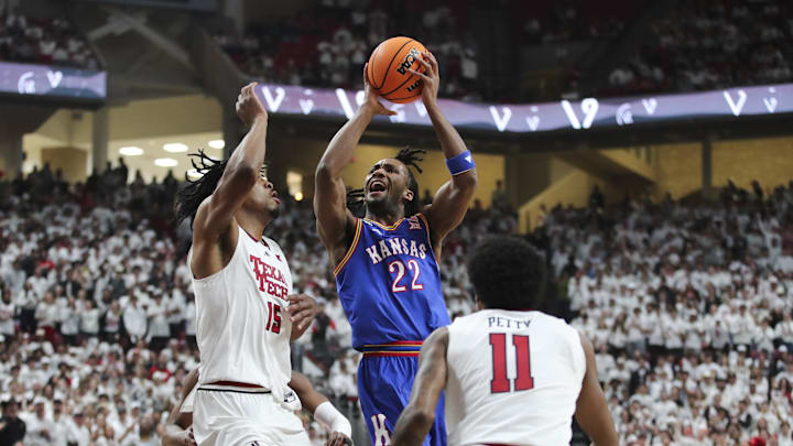 Feb 2, 2026; Lubbock, Texas, USA; Kansas Jayhawks guard Darryn Peterson (22) goes to the basket against Texas Tech Red Raiders forward JT Toppin (15) in the first half at United Supermarkets Arena. Mandatory Credit: Michael C. Johnson-Imagn Images Feb 2, 2026; Lubbock, Texas, USA; Kansas Jayhawks guard Darryn Peterson (22) goes to the basket against Texas Tech Red Raiders forward JT Toppin (15) in the first half at United Supermarkets Arena. Mandatory Credit: Michael C. Johnson-Imagn Images