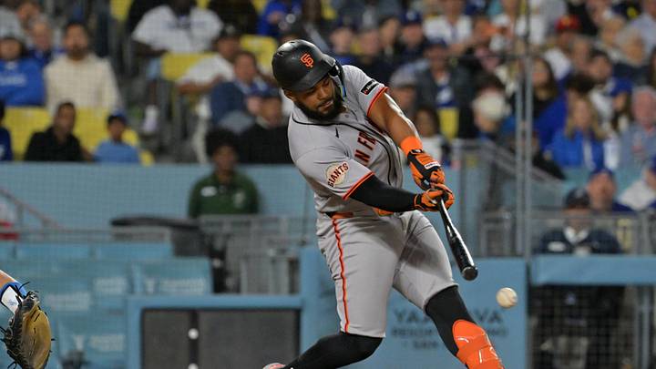 May 12, 2026; Los Angeles, California, USA; San Francisco Giants left fielder Heliot Ramos (17) hits a double against Los Angeles Dodgers starting pitcher Yoshinobu Yamamoto (not pictured) during the seventh inning at Dodger Stadium. Mandatory Credit: Jayne Kamin-Oncea-Imagn Images