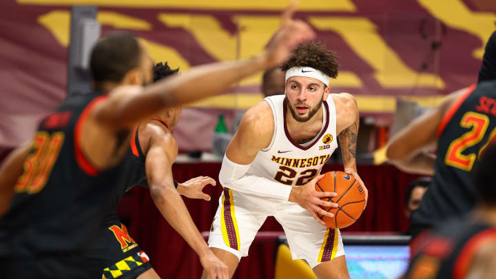 Minnesota guard Gabe Kalscheur (22) looks to passes the ball during the second half against Maryland at Williams Arena in Minneapolis on Jan. 23, 2021.