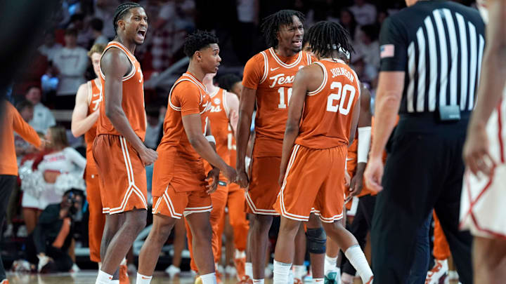Texas Longhorns forward Nic Codie (10) and Texas Longhorns guard Tre Johnson (20) celebrate during an SEC men's college basketball game between the University of Oklahoma Sooners (OU) and the Texas Longhorns at Lloyd Noble Center in Norman, Okla., Wednesday, Jan. 15, 2025. Texas won 77-73. Texas Longhorns forward Nic Codie (10) and Texas Longhorns guard Tre Johnson (20) celebrate during an SEC men's college basketball game between the University of Oklahoma Sooners (OU) and the Texas Longhorns at Lloyd Noble Center in Norman, Okla., Wednesday, Jan. 15, 2025. Texas won 77-73.