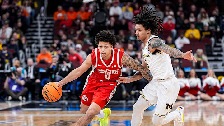 Ohio State guard John Mobley Jr. (0) dribbles against Michigan guard Elliot Cadeau (3) during the first half of Big Ten tournament quarterfinal at United Center in Chicago on Friday, March 13, 2026.