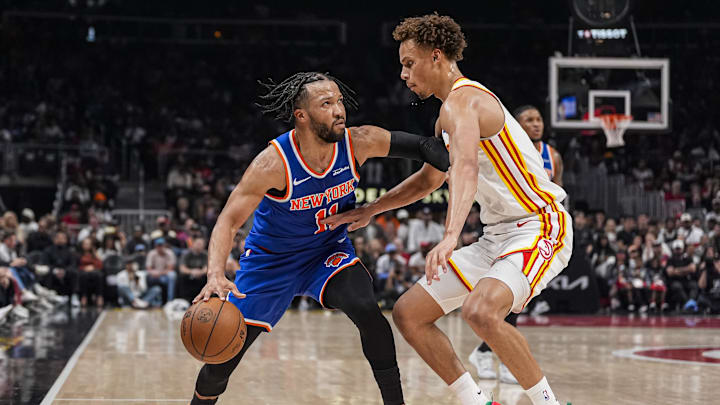 Apr 25, 2026; Atlanta, Georgia, USA; New York Knicks guard Jalen Brunson (11) dribbles against Atlanta Hawks guard Dyson Daniels (5) during the first half at State Farm Arena. Mandatory Credit: Dale Zanine-Imagn Images