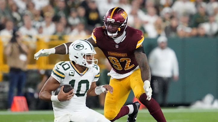 Washington Commanders defensive end Dorance Armstrong sacks Green Bay Packers quarterback Jordan Love. Washington Commanders defensive end Dorance Armstrong sacks Green Bay Packers quarterback Jordan Love.