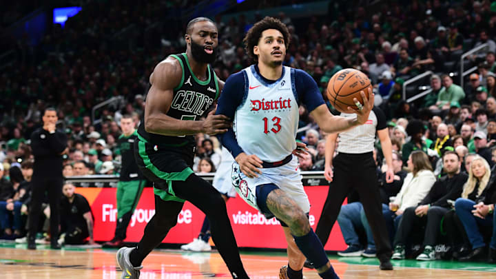 Apr 6, 2025; Boston, Massachusetts, USA; Washington Wizards guard Jordan Poole (13) drives to the basket while Boston Celtics guard Jaylen Brown (7) defends during the first half at TD Garden. Mandatory Credit: Bob DeChiara-Imagn Images Apr 6, 2025; Boston, Massachusetts, USA; Washington Wizards guard Jordan Poole (13) drives to the basket while Boston Celtics guard Jaylen Brown (7) defends during the first half at TD Garden. Mandatory Credit: Bob DeChiara-Imagn Images