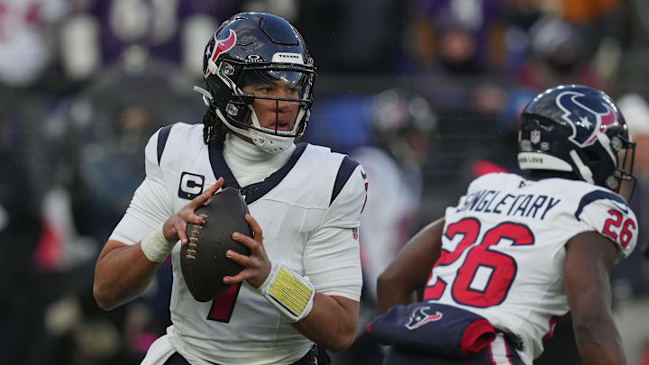 Jan 20, 2024; Baltimore, MD, USA; Houston Texans quarterback C.J. Stroud (7) drops back to pass against the Baltimore Ravens in the first half of a 2024 AFC divisional round game at M&T Bank Stadium. Mandatory Credit: Mitch Stringer-USA TODAY Sports