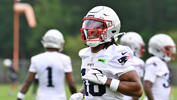 Jun 9, 2025; Foxborough, MA, USA; New England Patriots wide receiver Kyle Williams (18) reacts after completing a drill during minicamp at Gillette Stadium. Mandatory Credit: Eric Canha-Imagn Images