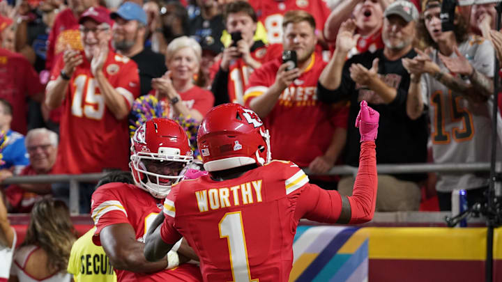Oct 12, 2025; Kansas City, Missouri, USA; Kansas City Chiefs wide receiver Xavier Worthy (1) reacts after a touchdown against the Detroit Lions during the first half at GEHA Field at Arrowhead Stadium. Mandatory Credit: Denny Medley-Imagn Images