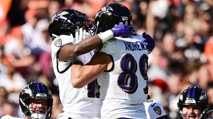 Baltimore Ravens wide receiver Nelson Agholor (15) celebrates with tight end Mark Andrews (89) after catching a touchdown pass during the first half against the Cleveland Browns at Huntington Bank Field. 