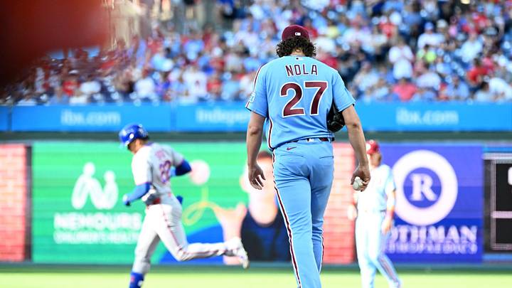 Jun 18, 2026; Philadelphia, Pennsylvania, USA; Philadelphia Phillies pitcher Aaron Nola (27) reacts after after allowing a home run by New York Mets left fielder Juan Soto (22) during the first inning at Citizens Bank Park. Mandatory Credit: Eric Hartline-Imagn Images