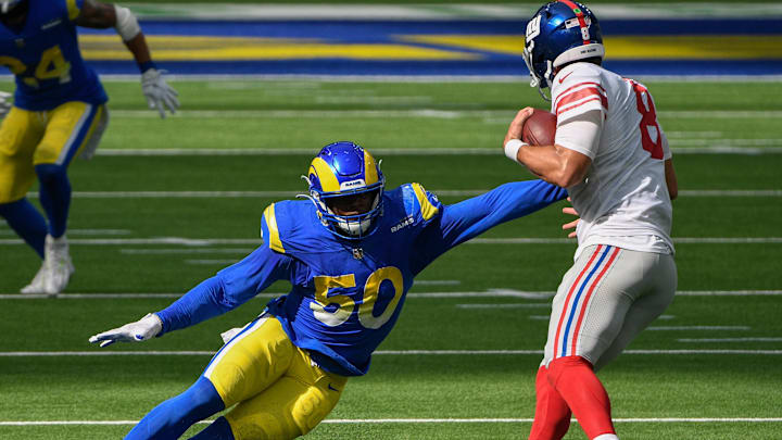 Oct 4, 2020; Inglewood, California, USA; Los Angeles Rams outside linebacker Samson Ebukam (50) tries to stop New York Giants quarterback Daniel Jones (8) on a second half scramble at SoFi Stadium. Mandatory Credit: Robert Hanashiro-Imagn Images