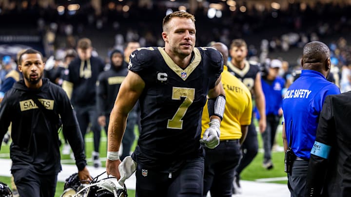 Sep 8, 2024; New Orleans, Louisiana, USA;  New Orleans Saints quarterback Taysom Hill (7) heads to the locker room after the game against the Carolina Panthers at Caesars Superdome. Mandatory Credit: Stephen Lew-Imagn Images