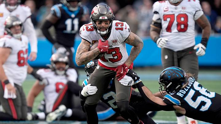 Tampa Bay Buccaneers wide receiver Mike Evans (13) runs against Carolina Panthers linebacker Christian Rozeboom (56) during the second half at Bank of America Stadium. 