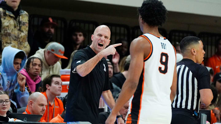 Oklahoma State coach Steve Lutz shouts at Oklahoma State Cowboys guard Anthony Roy (9) during a BIG 12 men's college basketball game between the Oklahoma State Cowboys (OSU) and the BYU Cougars at Gallagher-Iba Arena in Stillwater, Okla., Wednesday, Feb. 4, 2026.