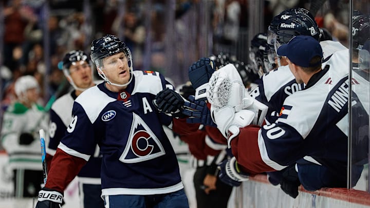 Oct 11, 2025; Denver, Colorado, USA; Colorado Avalanche center Nathan MacKinnon (29) celebrates with the bench after his goal in the third period against the Dallas Stars at Ball Arena. Mandatory Credit: Isaiah J. Downing-Imagn Images