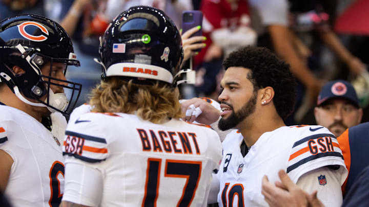 Nov 3, 2024; Glendale, Arizona, USA; Chicago Bears quarterback Caleb Williams (18) with Tyson Bagent (17) against the Arizona Cardinals at State Farm Stadium. Mandatory Credit: Mark J. Rebilas-Imagn Images