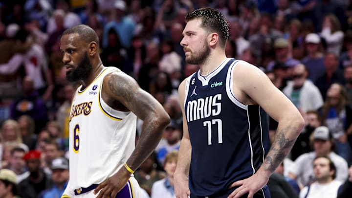 Feb 26, 2023; Dallas, Texas, USA; Los Angeles Lakers forward LeBron James (6) and Dallas Mavericks guard Luka Doncic (77) during the fourth quarter at American Airlines Center. Mandatory Credit: Kevin Jairaj-Imagn Images
