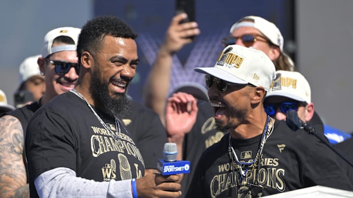 Nov 1, 2024; Los Angeles, CA, USA;  Los Angeles Dodgers left fielder Teoscar Hernandez (37) and right fielder Mookie Betts (50) during the World Series Championship Celebration at Dodger Stadium. Mandatory Credit: Jayne Kamin-Oncea-Imagn Images