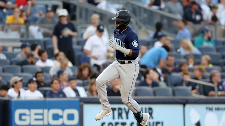 Seattle Mariners designated hitter Kyle Lewis (1) rounds the bases after hitting a solo home run against the New York Yankees during the second inning at Yankee Stadium in 2022.