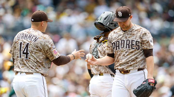 May 24, 2026; San Diego, California, USA; San Diego Padres manager Craig Stammen (14) takes the ball from starting pitcher Michael King (34) during a pitching change during the fourth inning /against the Athletics at Petco Park. Mandatory Credit: David Frerker-Imagn Images May 24, 2026; San Diego, California, USA; San Diego Padres manager Craig Stammen (14) takes the ball from starting pitcher Michael King (34) during a pitching change during the fourth inning /against the Athletics at Petco Park. Mandatory Credit: David Frerker-Imagn Images