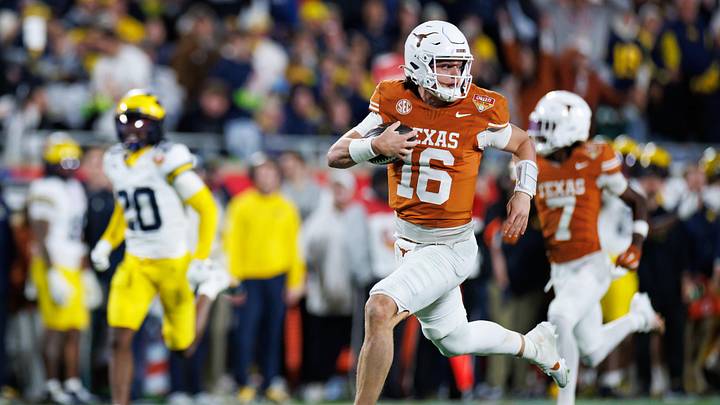 Dec 31, 2025; Orlando, FL, USA; Texas Longhorns quarterback Arch Manning (16) rushes with the ball for a touchdown against the Michigan Wolverines during the second half at Camping World Stadium. Mandatory Credit: Matt Pendleton-Imagn Images Dec 31, 2025; Orlando, FL, USA; Texas Longhorns quarterback Arch Manning (16) rushes with the ball for a touchdown against the Michigan Wolverines during the second half at Camping World Stadium. Mandatory Credit: Matt Pendleton-Imagn Images