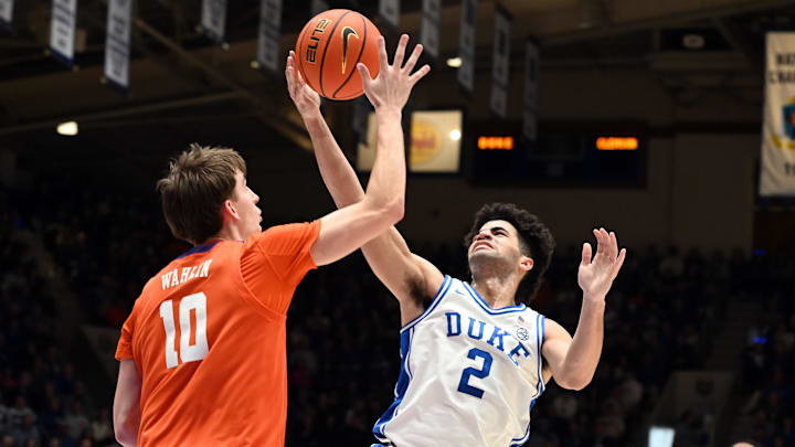 Clemson forward Jake Wahlin tries to block a shot from Duke's Cayden Boozer in the Tigers' loss to the Blue Devils. Clemson forward Jake Wahlin tries to block a shot from Duke's Cayden Boozer in the Tigers' loss to the Blue Devils.