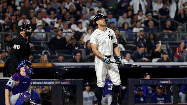 New York Yankees designated hitter Giancarlo Stanton (27) reacts after hitting a home run during the third inning against the Los Angeles Dodgers in game five of the 2024 MLB World Series at Yankee Stadium in 2024. New York Yankees designated hitter Giancarlo Stanton (27) reacts after hitting a home run during the third inning against the Los Angeles Dodgers in game five of the 2024 MLB World Series at Yankee Stadium in 2024.