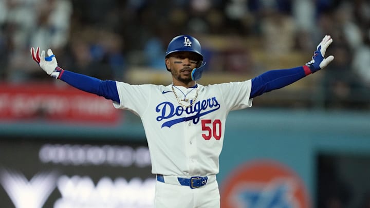 Mar 30, 2026; Los Angeles, California, USA; Los Angeles Dodgers shortstop Mookie Betts (50) celebrates after hitting a double against the Cleveland Guardians in the ninth inning at Dodger Stadium. Mandatory Credit: Kirby Lee-Imagn Images