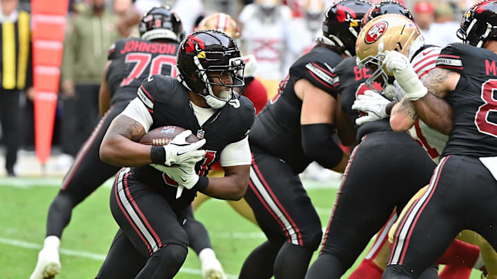 Nov 16, 2025; Glendale, Arizona, USA; Arizona Cardinals running back Emari Demercado (31) runs the ball in the first half against the San Francisco 49ers at State Farm Stadium. Mandatory Credit: Matt Kartozian-Imagn Images Nov 16, 2025; Glendale, Arizona, USA; Arizona Cardinals running back Emari Demercado (31) runs the ball in the first half against the San Francisco 49ers at State Farm Stadium. Mandatory Credit: Matt Kartozian-Imagn Images